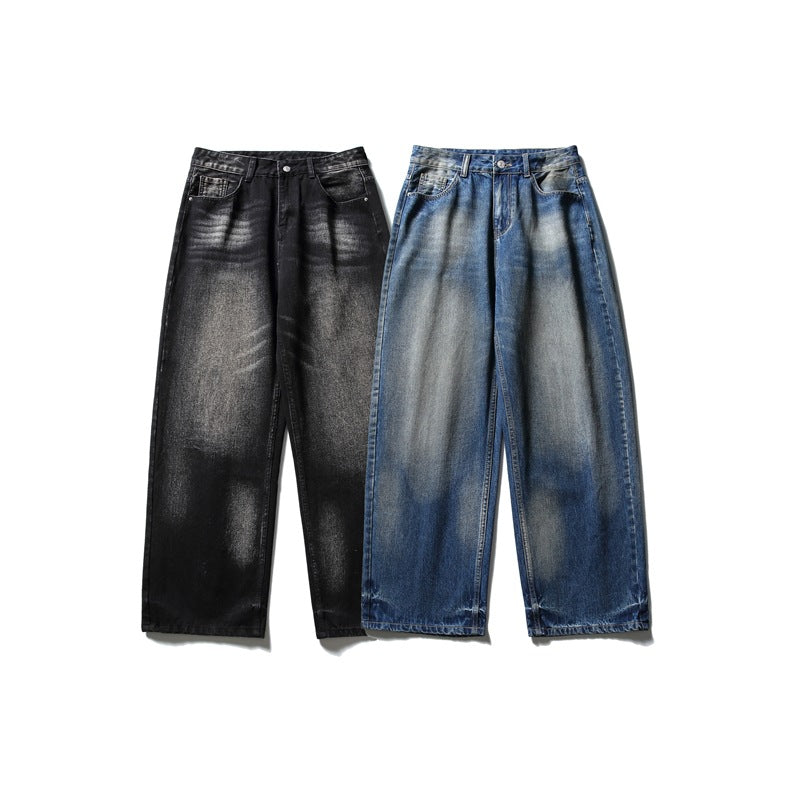 Two pairs of wide-leg jeans shown from the front: one black faded pair and one blue faded pair.