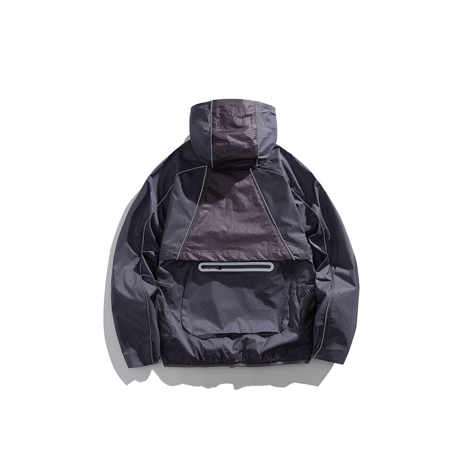 Back view of a dark charcoal hooded jacket with a large rear pocket and mesh side panels.