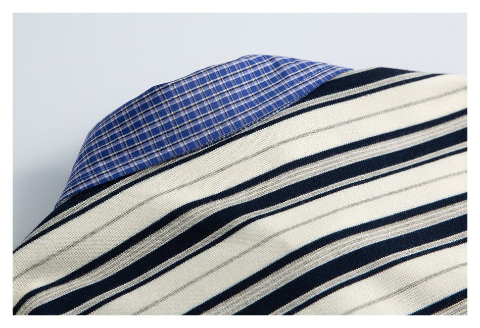 Close-up of cream knit fabric with navy and gray stripes beside a blue plaid panel.