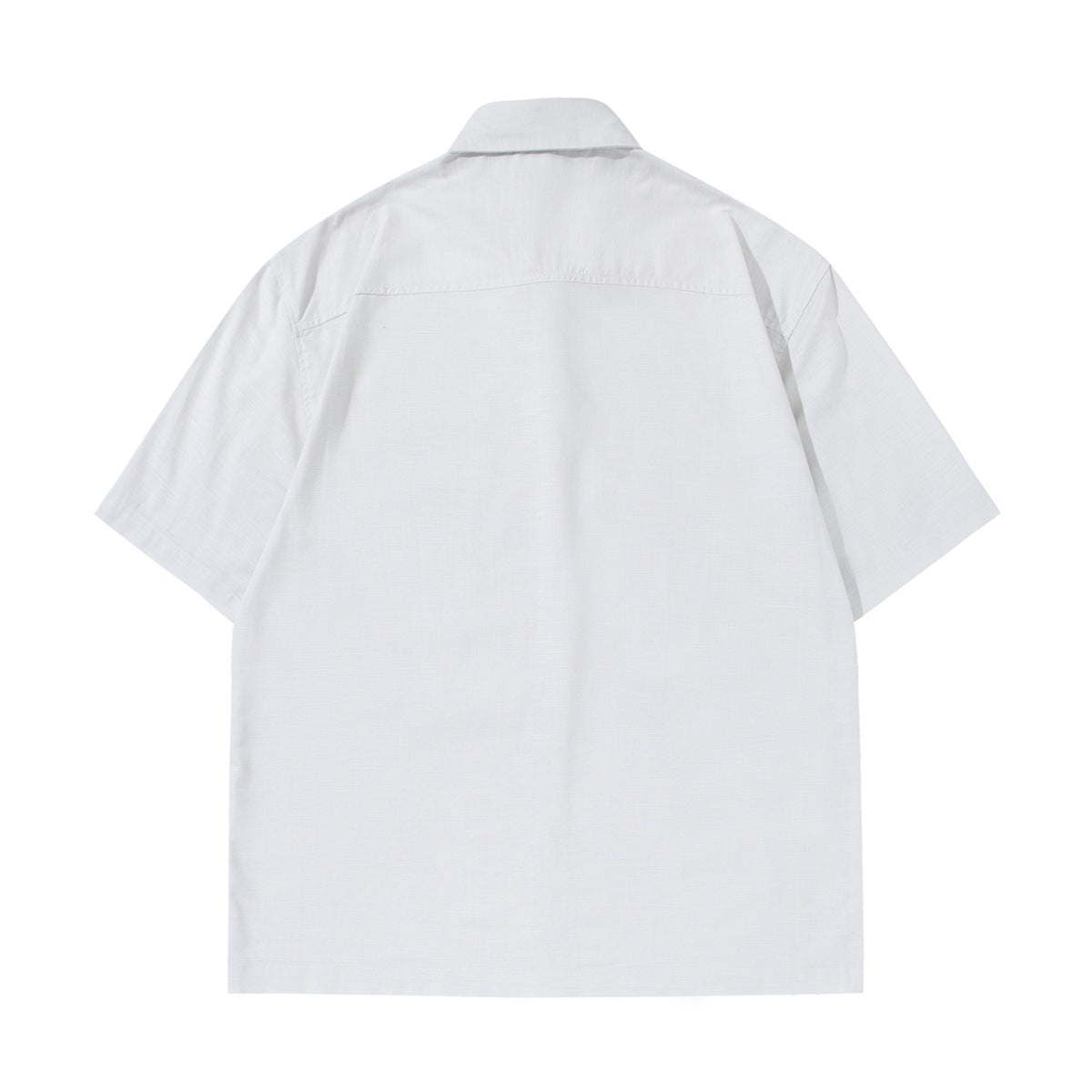 Back view of a white short-sleeve button-up shirt with a horizontal yoke seam.