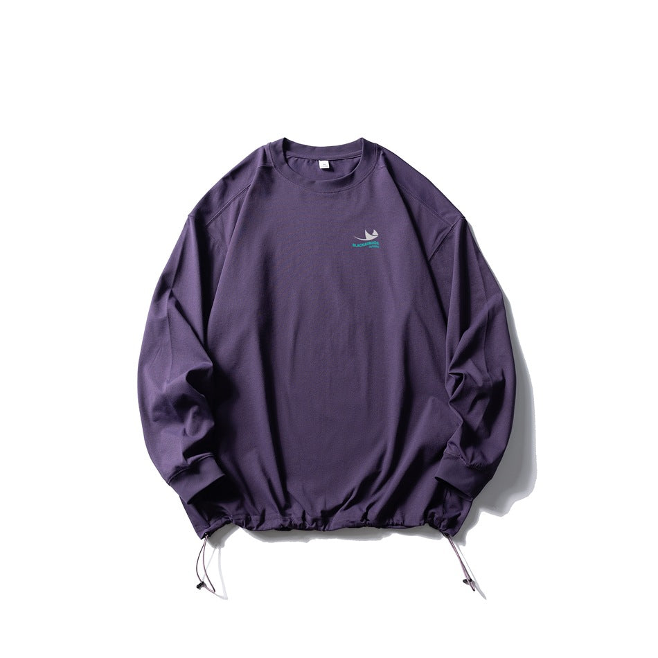 Purple long-sleeve crew-neck top flat lay with drawstring hem and small chest print