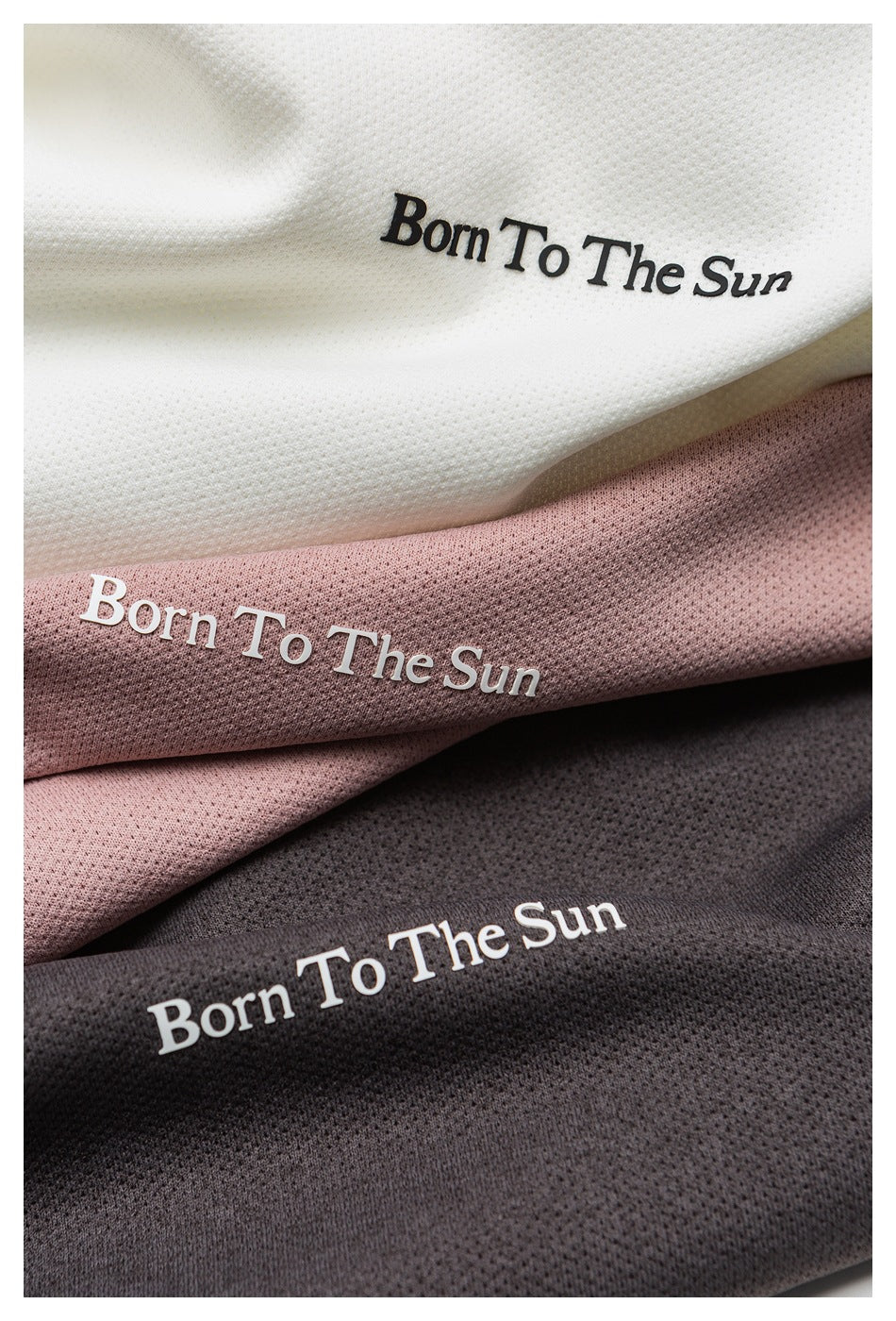 Close-up of white, dusty pink, and charcoal perforated fabric with “Born To The Sun” lettering.