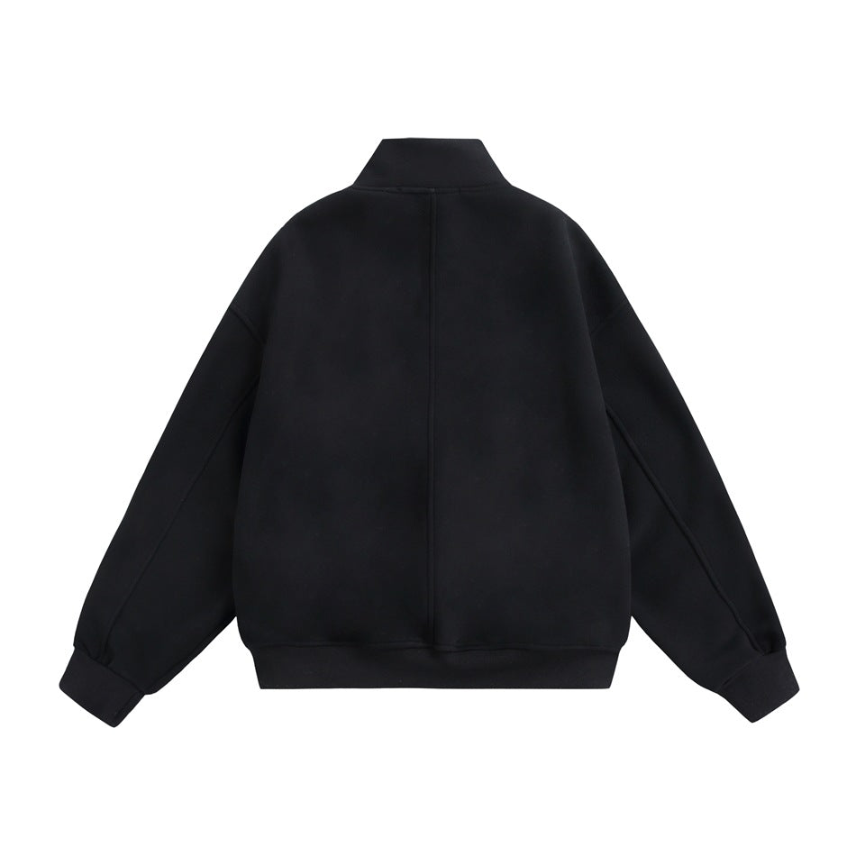 Back view of a black stand-collar jacket with a center seam, long sleeves, and ribbed cuffs and hem.