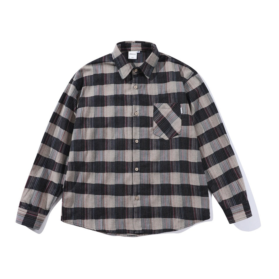 Black, charcoal and taupe plaid long-sleeve button-up shirt with chest pocket, flat lay front view