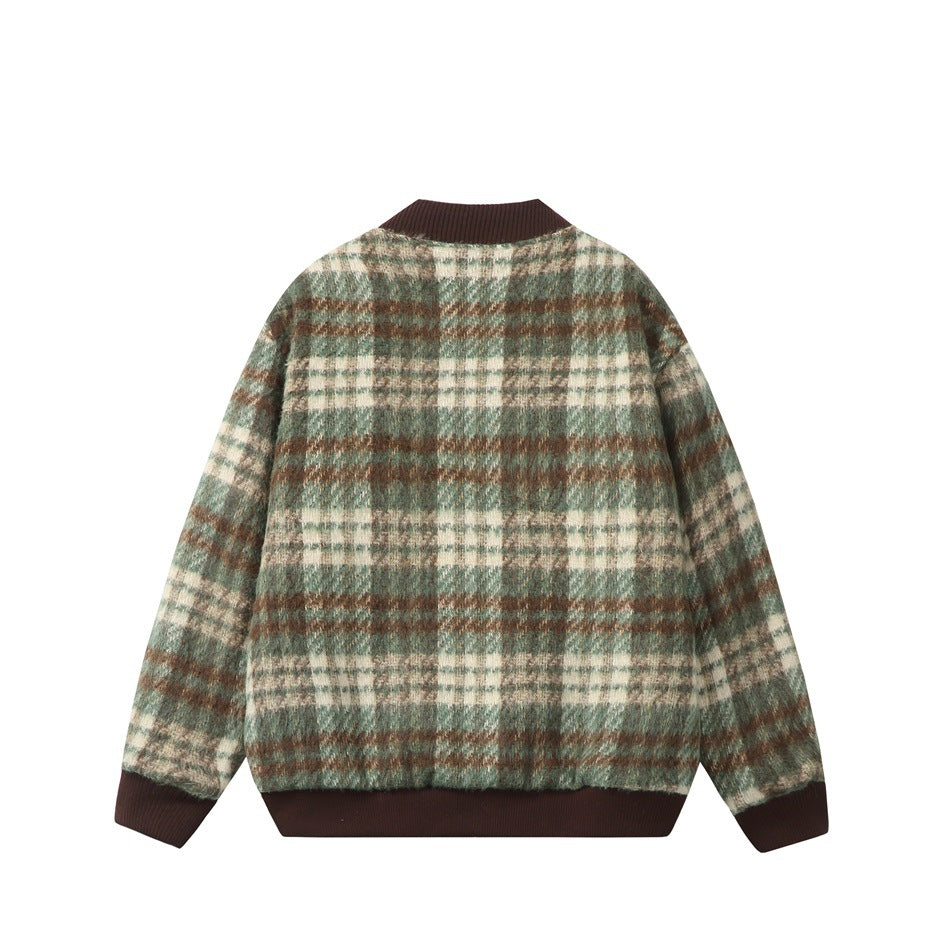 Back of a blue-gray, cream, and rust plaid jacket with dark brown ribbed collar, cuffs, and hem.