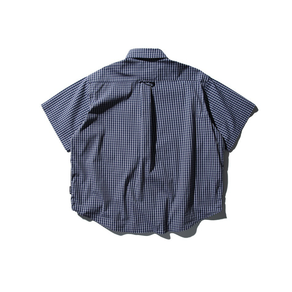 Back view of a navy short-sleeve button-up shirt with a white check pattern and center pleat.