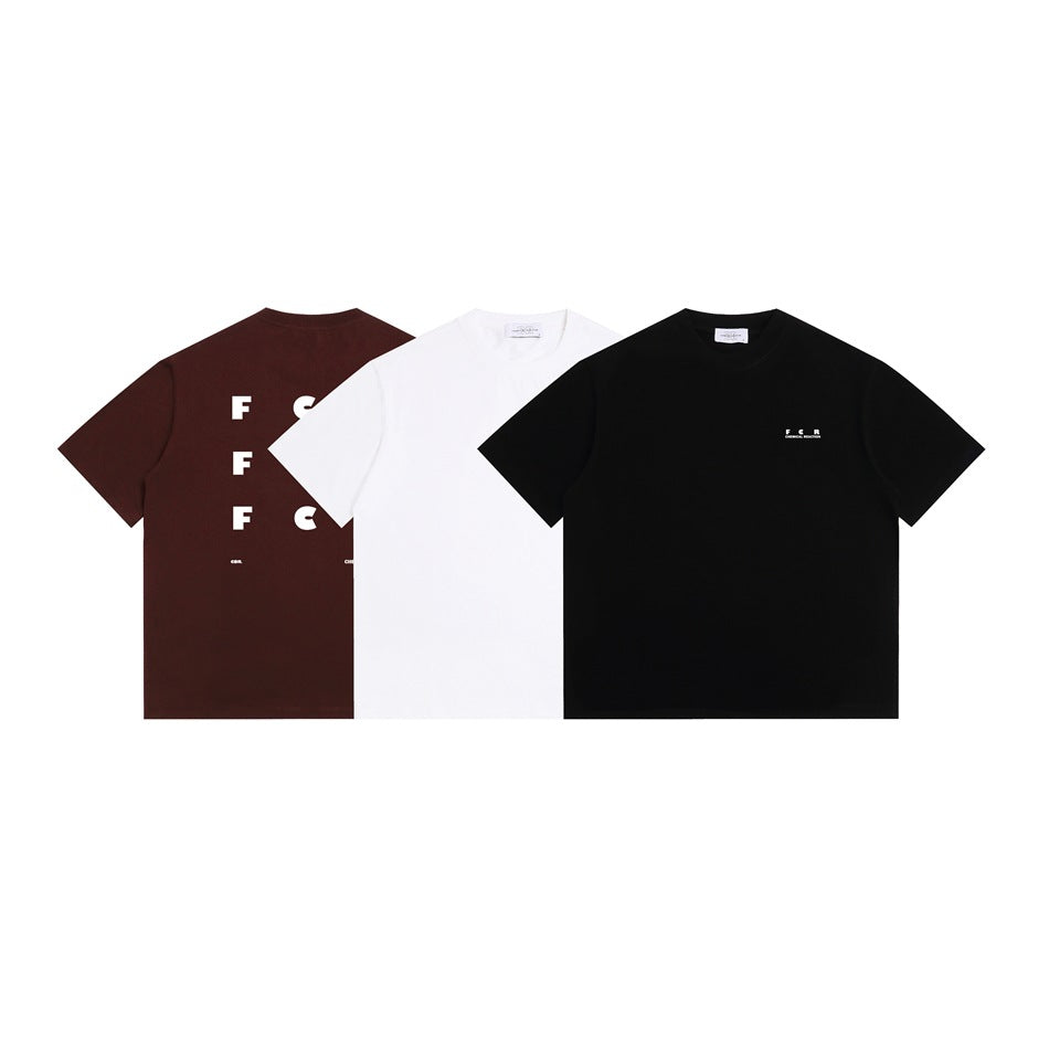 Burgundy, white, and black crew-neck T-shirts shown together, with different graphic placements.