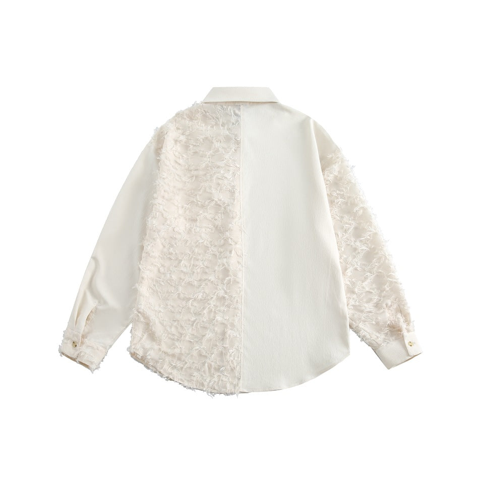 Back view of an ivory button-up shirt with a smooth right panel and textured left panel and sleeves.