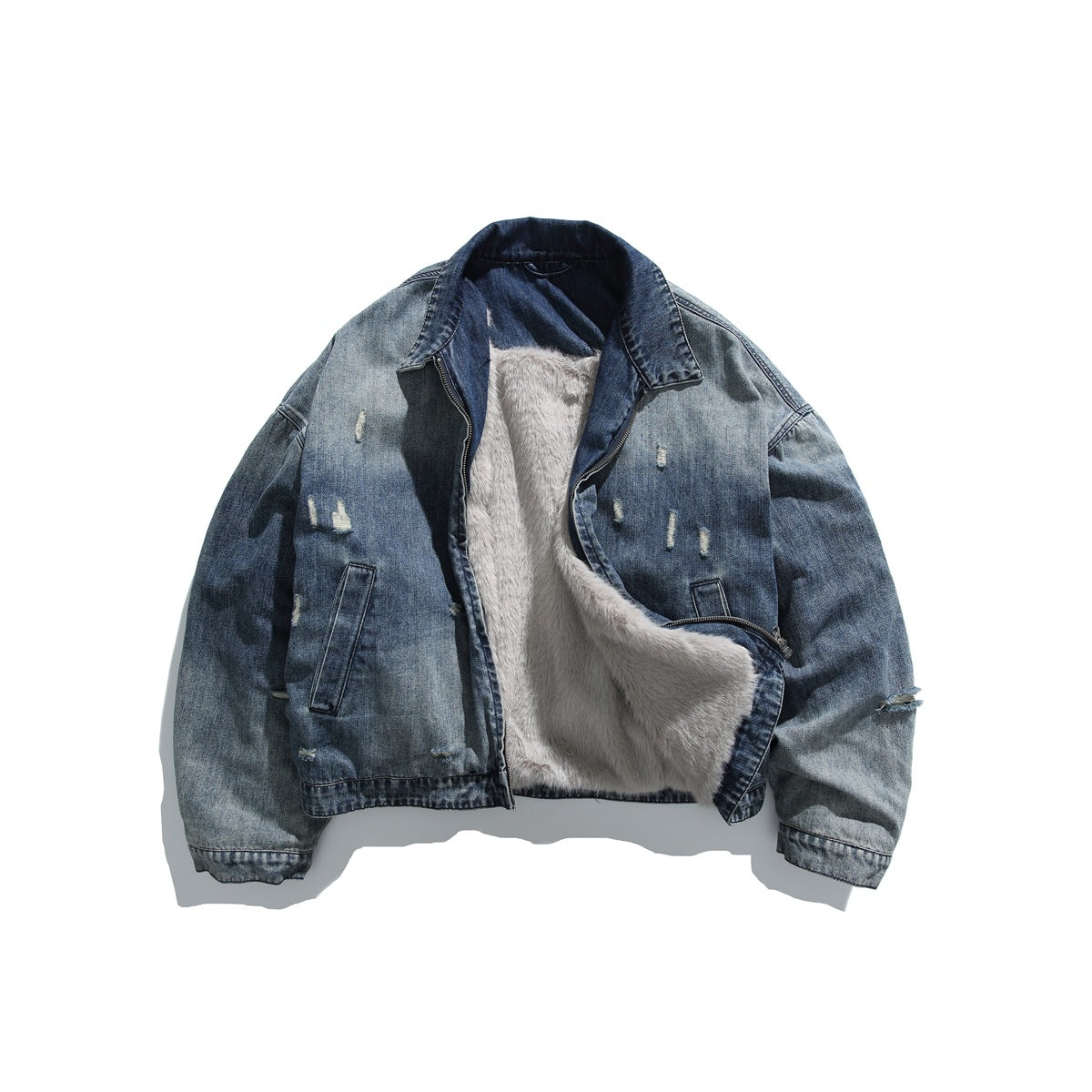 Front view of an open, distressed blue denim jacket with a light-colored plush lining and zippered pockets.