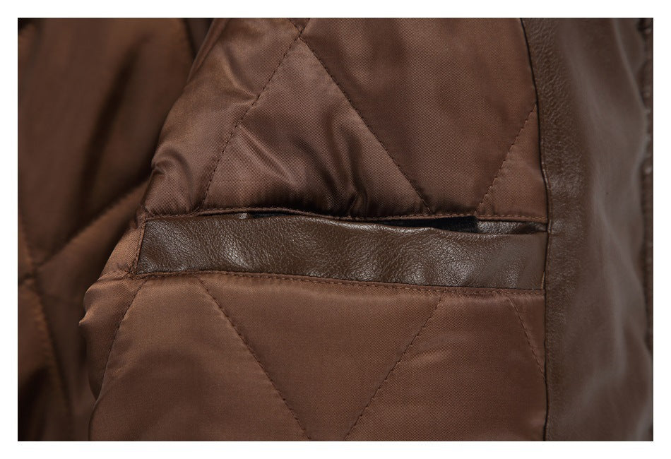 Close-up of the brown quilted jacket lining and a narrow horizontal inner pocket.