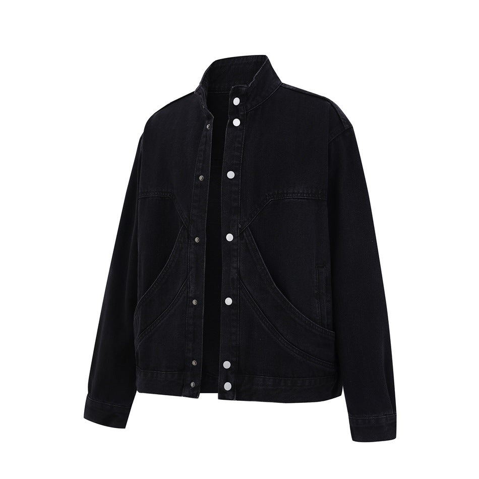 Black washed denim jacket with stand collar, snap buttons and curved front seam panels, shown flat from a three-quarter front