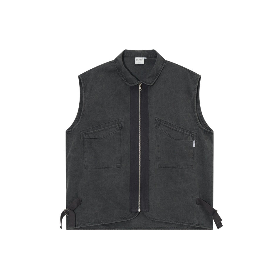 Black washed sleeveless zip vest with rounded collar, two flap chest pockets and side buckle straps, front flat view