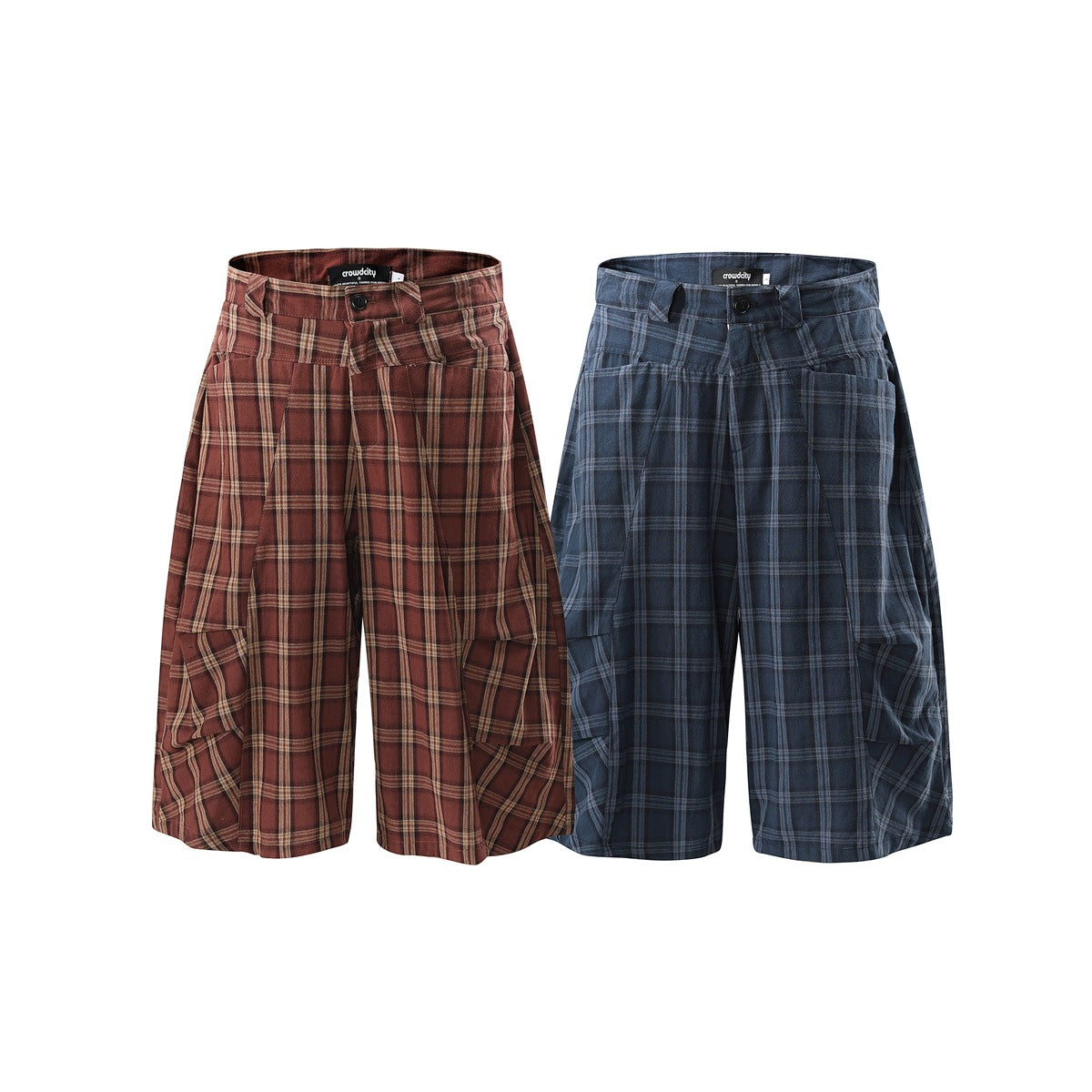 Front view of loose, long plaid shorts in rust brown and navy blue colorways.