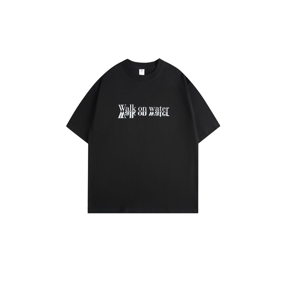 Black short-sleeve crew neck T-shirt with white 'Walk on water' mirrored text print on the chest