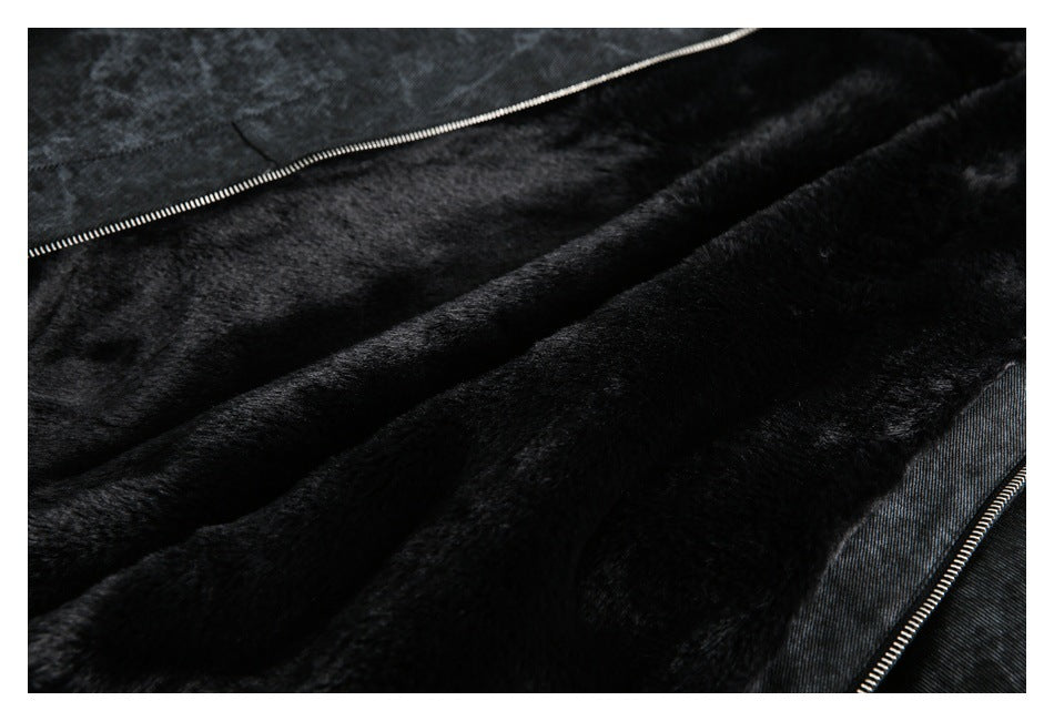 Close-up of the jacket's soft black plush lining beside a metal zipper.