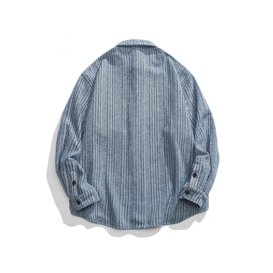 Back view of blue vertical-striped textured long-sleeve shirt with buttoned cuffs, flat lay