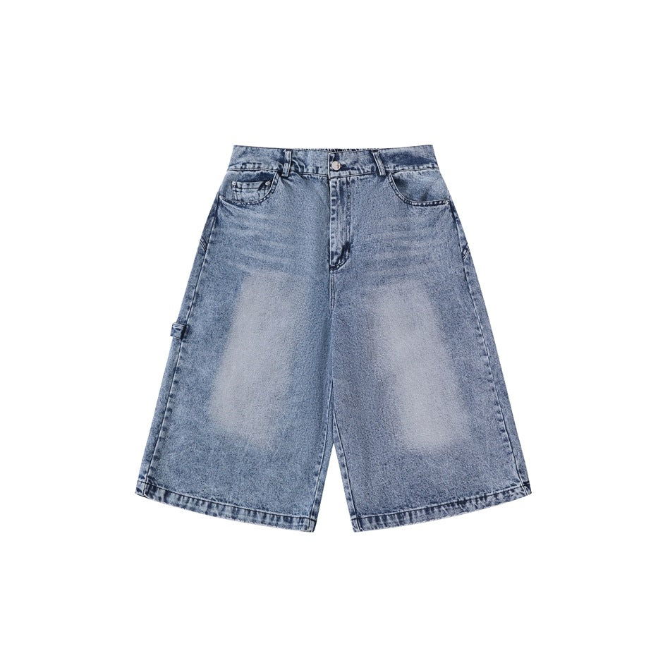 Front view of light blue washed denim knee-length shorts with zip fly, belt loops and side utility loop
