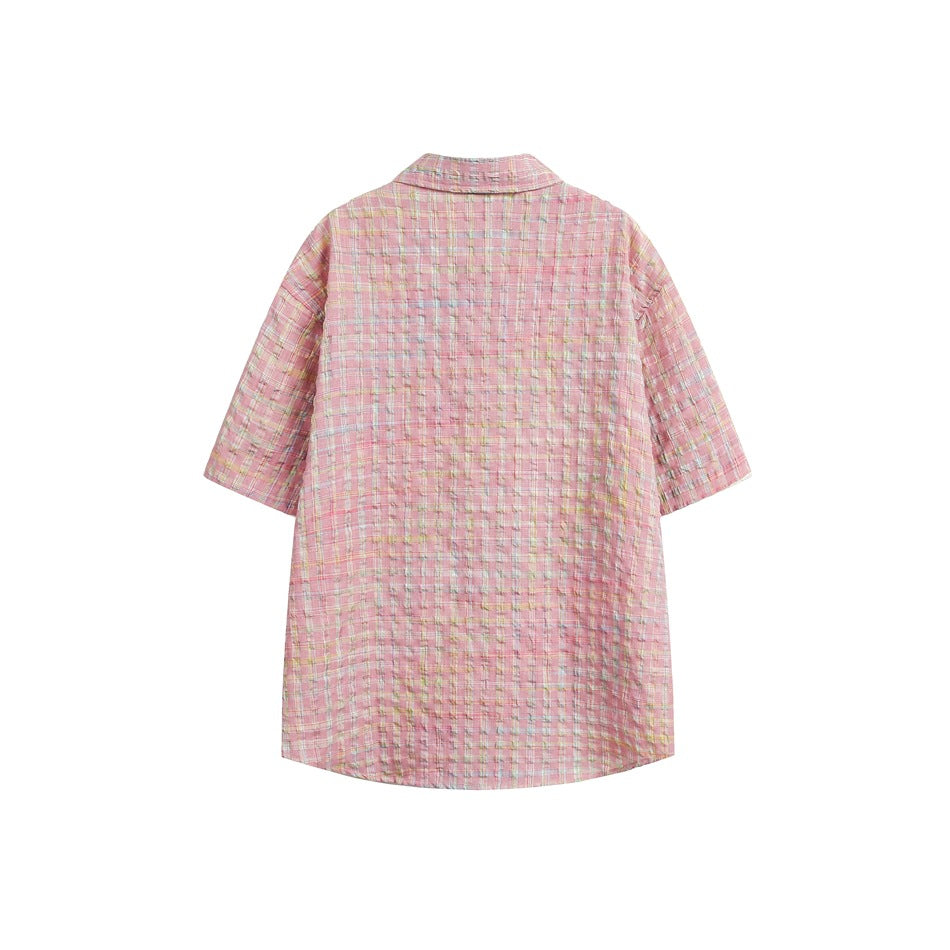 Back view of a pink pastel plaid short-sleeve button-up shirt on a white background.