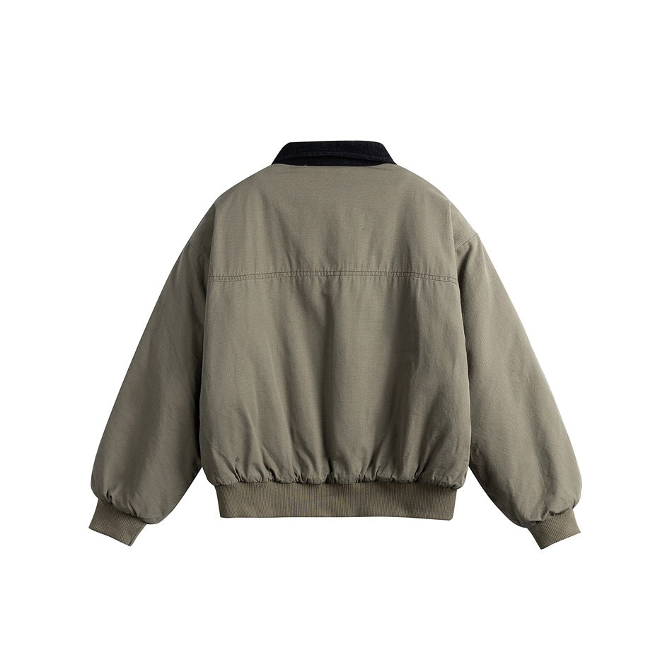 Back view of a gray olive jacket with a dark collar, gathered hem, and ribbed cuffs.
