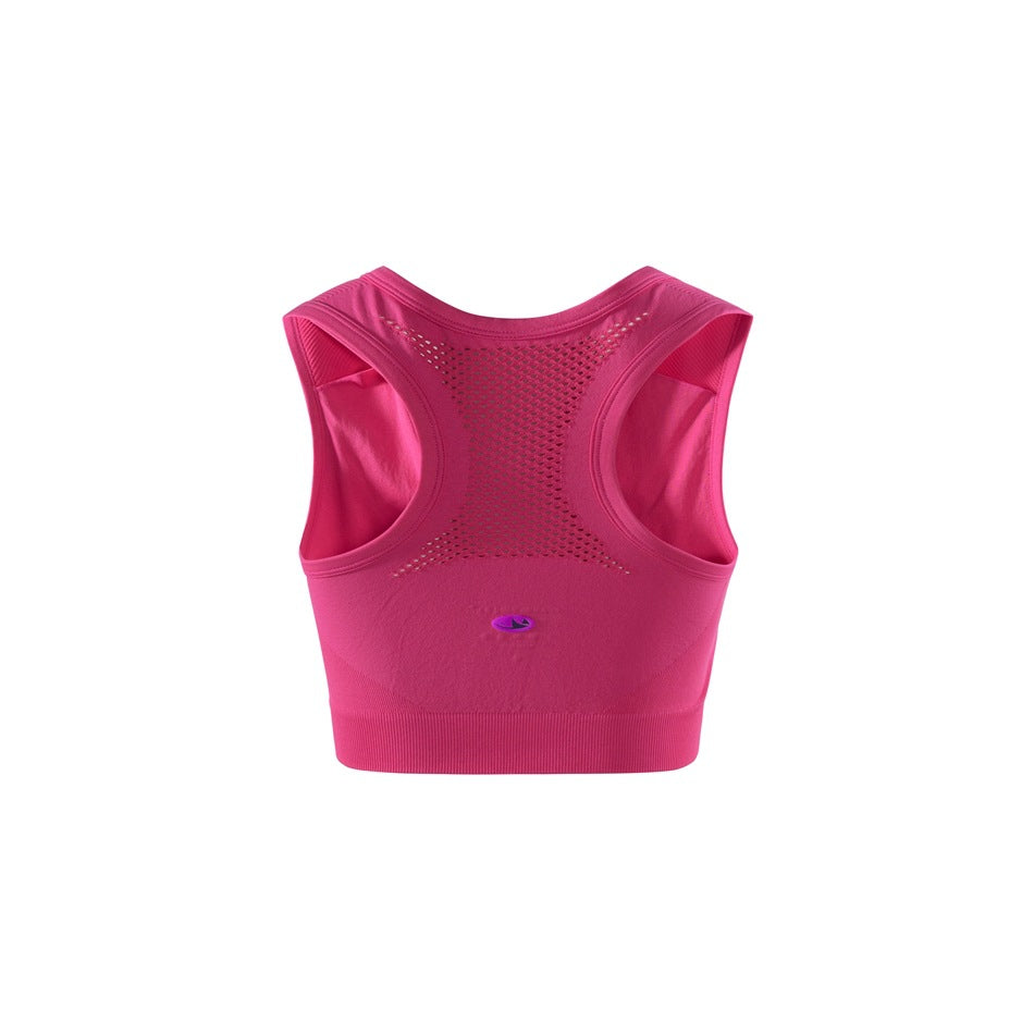 Back view of a bright fuchsia cropped sports bra with a perforated racerback panel and wide ribbed hem.