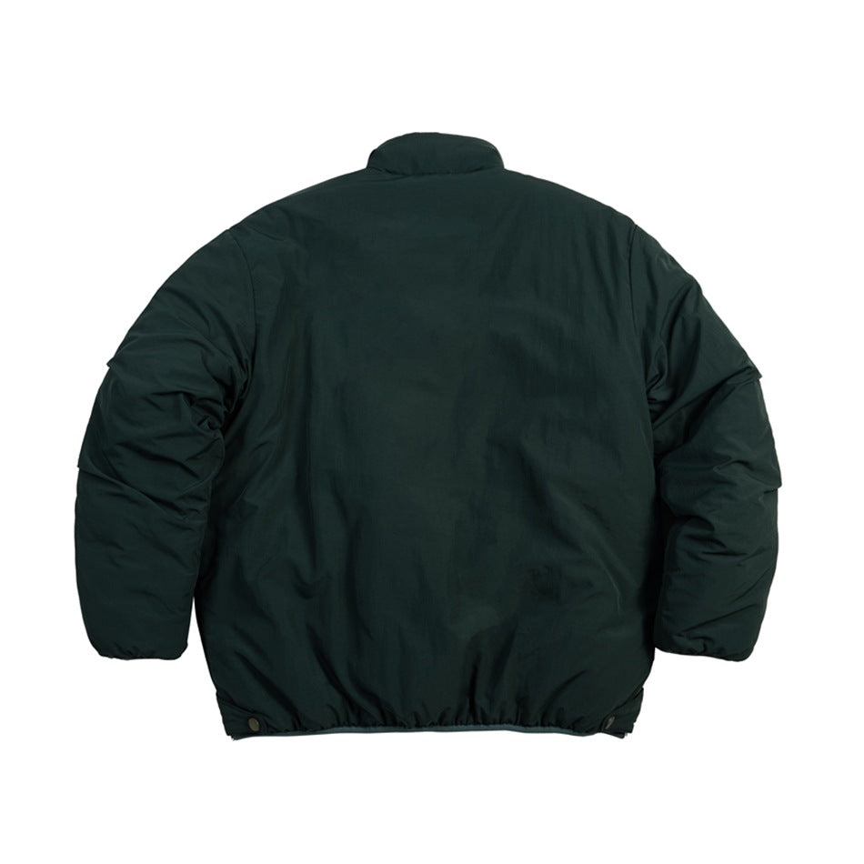 Back view of a dark green jacket with a high collar, rounded sleeves, and snap-adjustable hem.