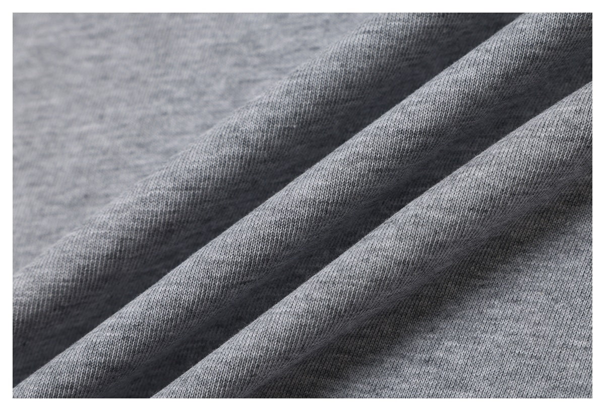 Close-up showing the heather gray knit fabric draped into soft folds.