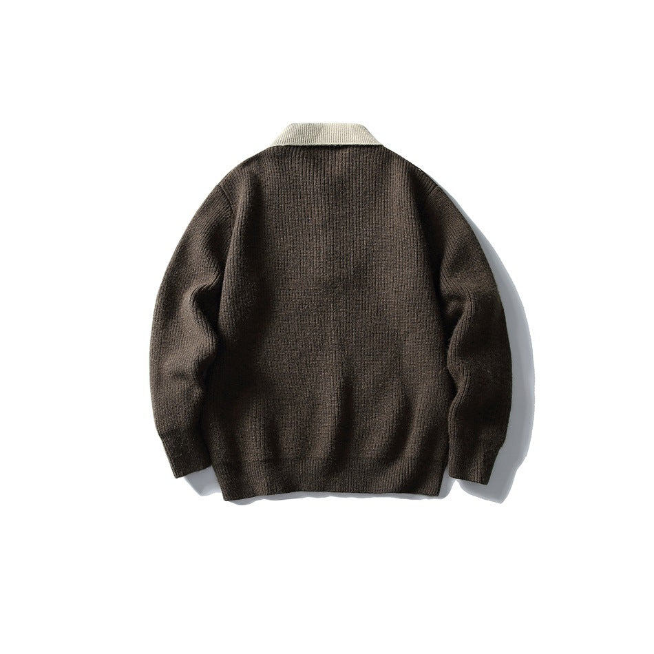Back view of a dark brown ribbed sweater with a contrasting ivory collar.