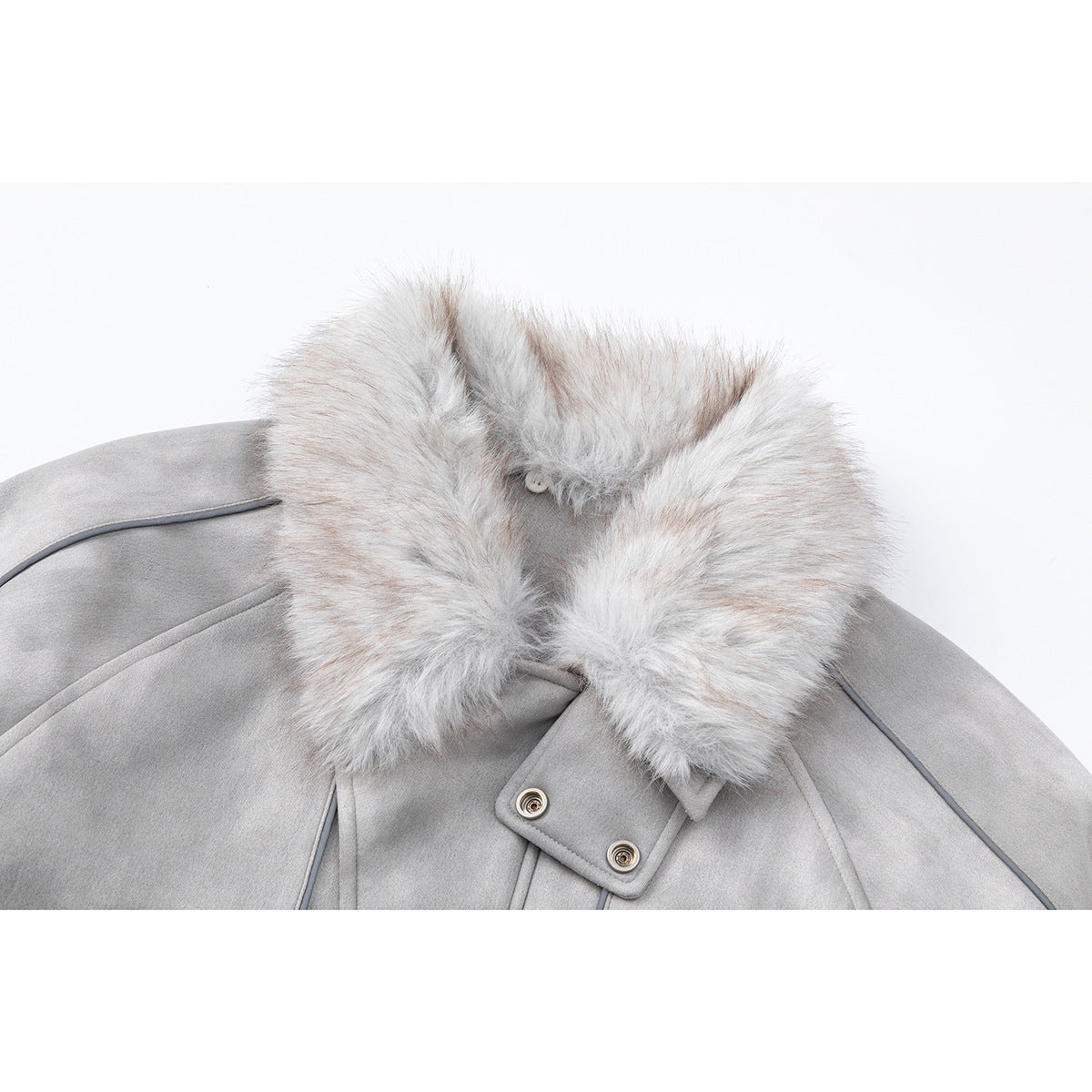 Close-up of a light gray coat with a large pale faux-fur collar and snap-button tab.