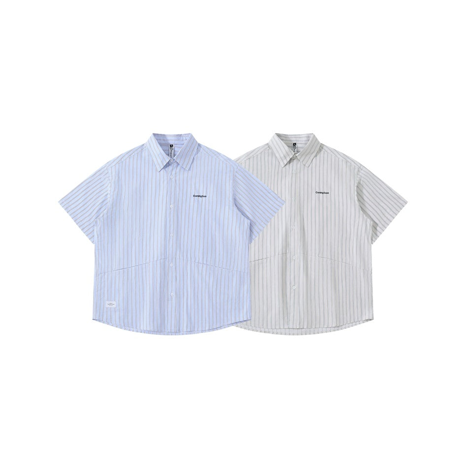 Two short-sleeve button-up shirts shown side by side, one pale blue and one white, both with thin vertical stripes.