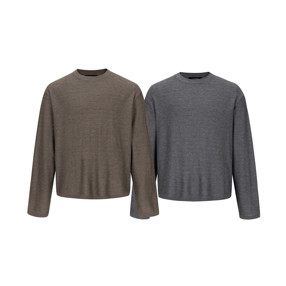 Front view of two plain long-sleeve crewneck sweaters, one brown-gray and one charcoal gray.