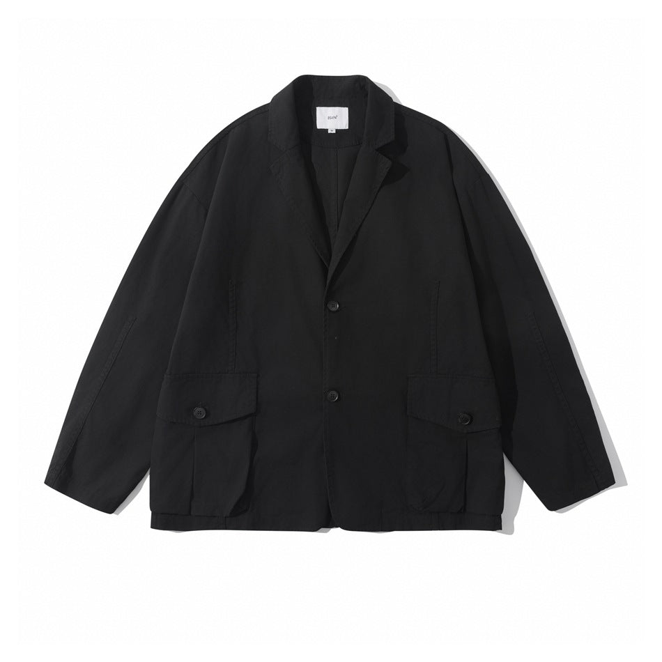 Black relaxed blazer-style jacket flat lay, front view with two buttons and two large flap pockets
