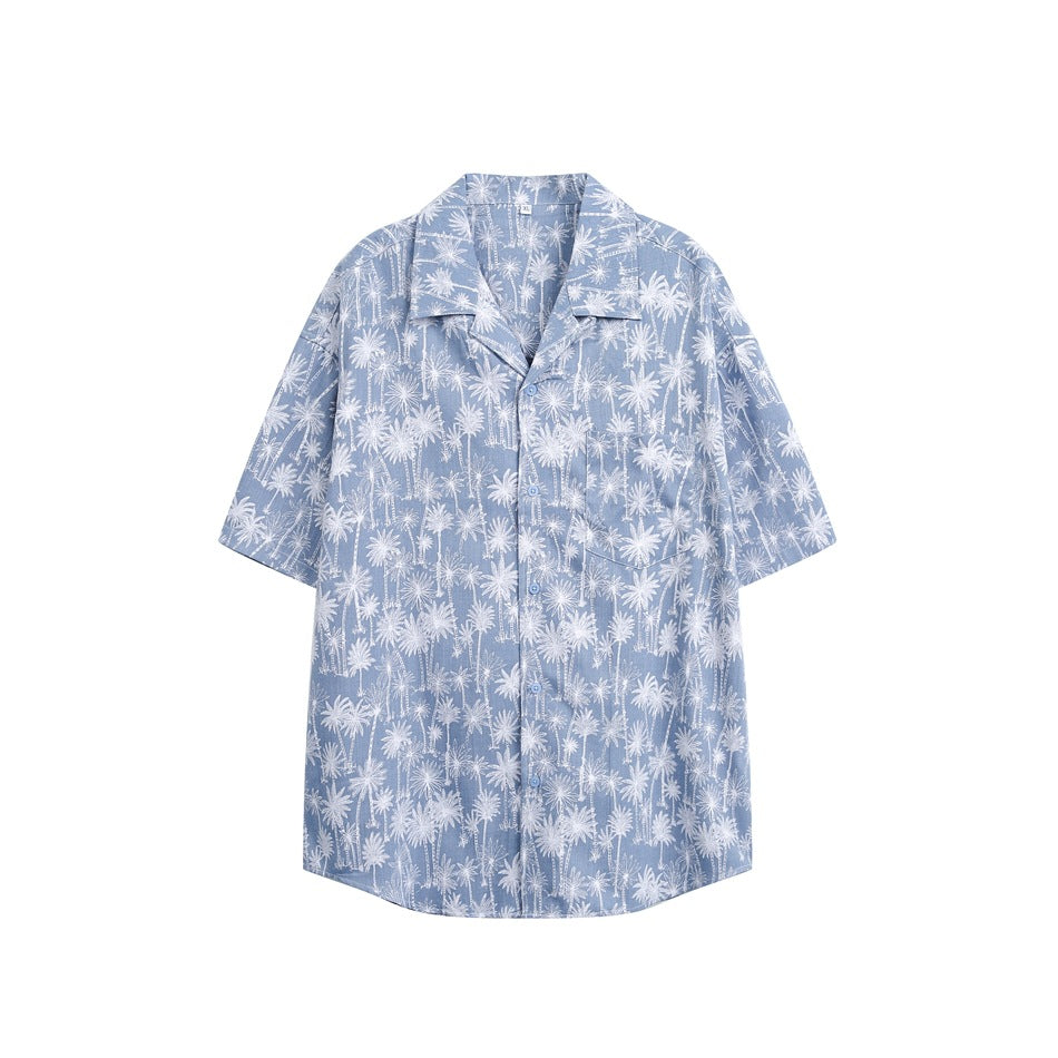 Light blue short-sleeve camp-collar shirt with white palm tree print, front view with buttons and chest pocket