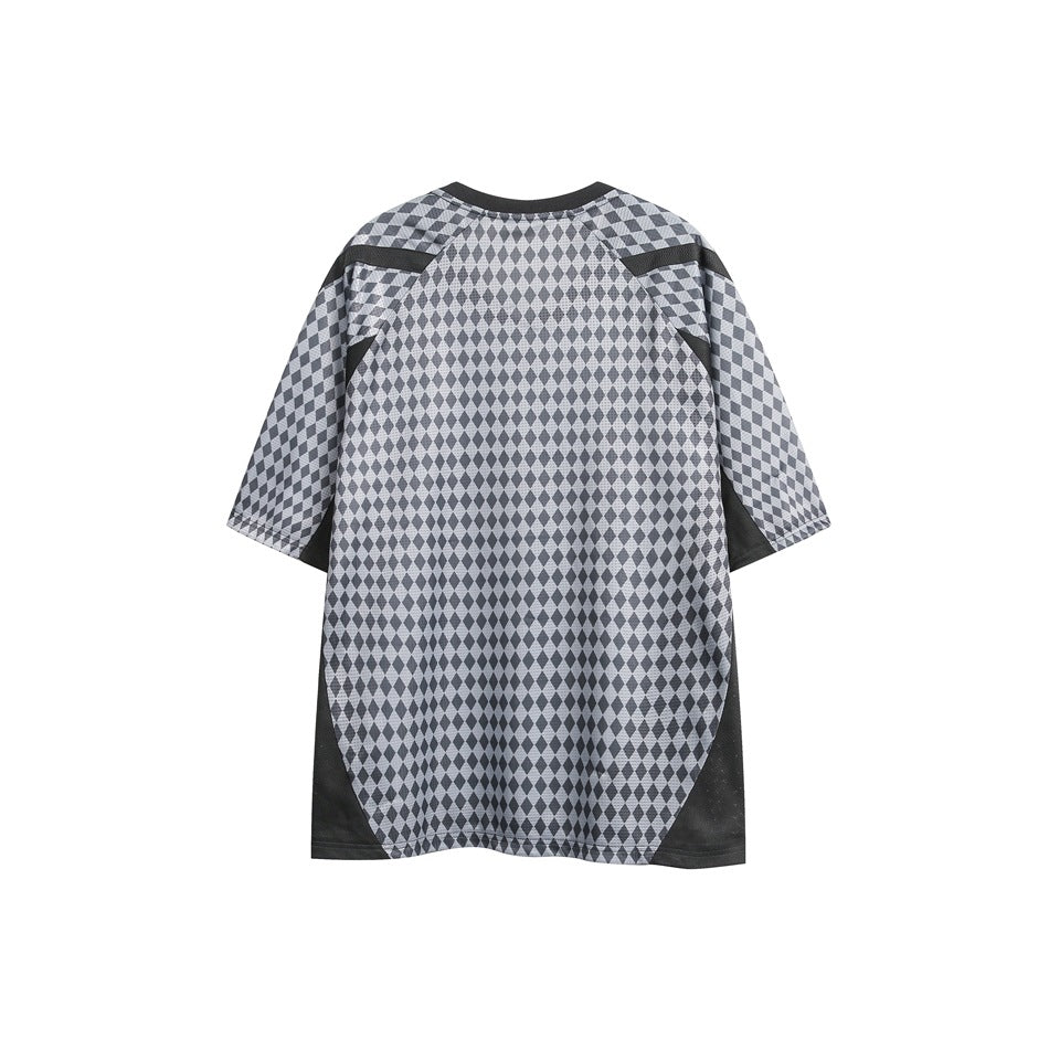 Back view of a charcoal and light gray diamond-patterned short-sleeve shirt with dark side panels.
