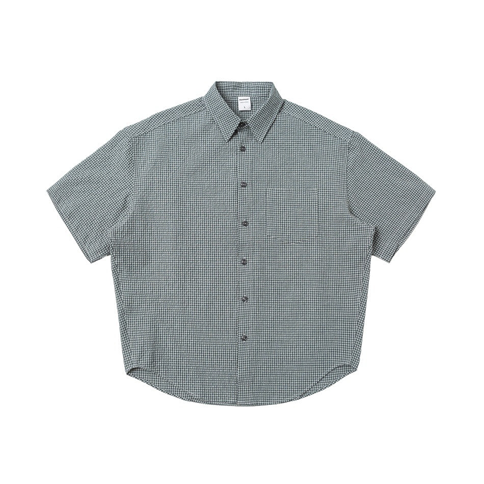 Blue-gray small-check short-sleeve button-up shirt with chest pocket, front flat lay