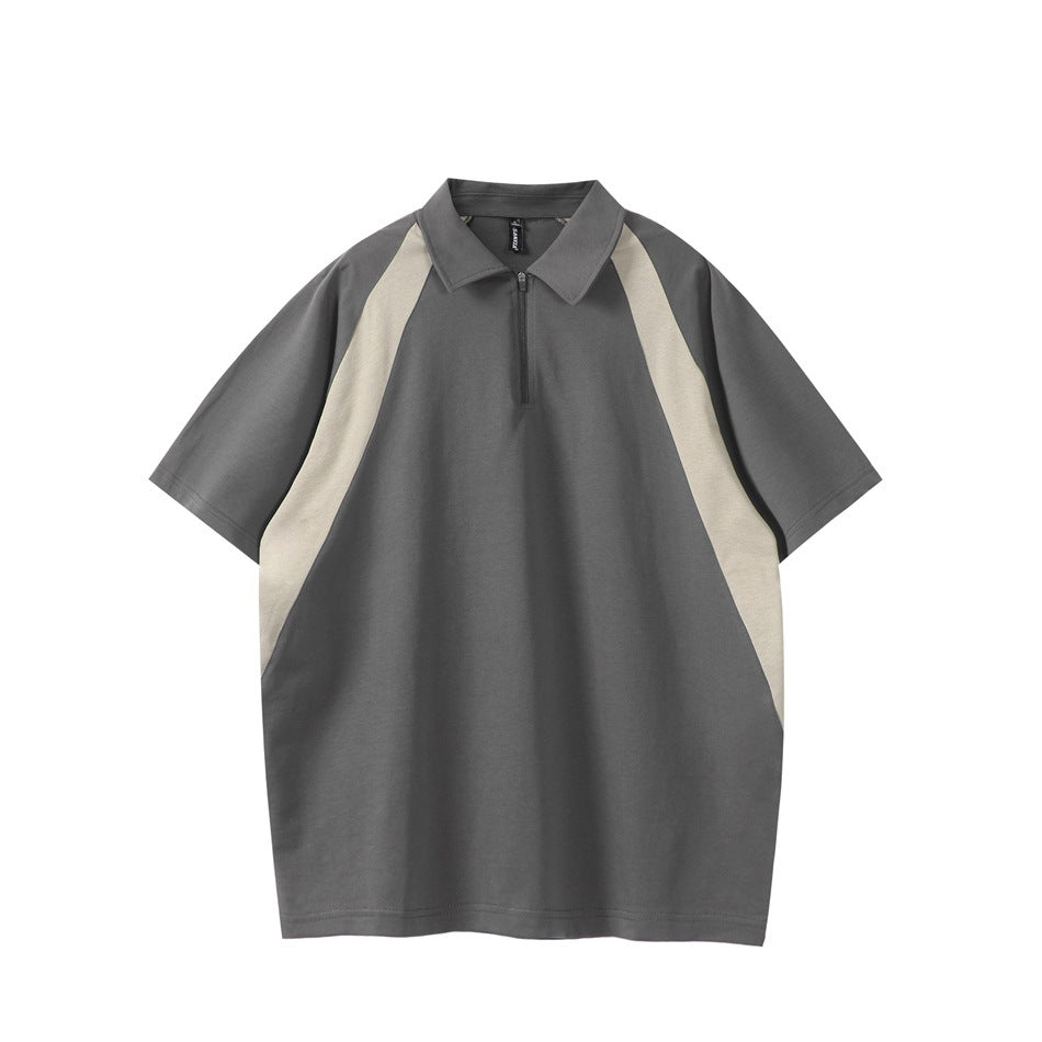 Gray short-sleeve quarter-zip polo with beige curved raglan panels, front view on white background