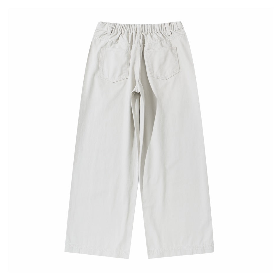 Back view of ivory wide-leg trousers with an elastic waistband and two patch pockets.