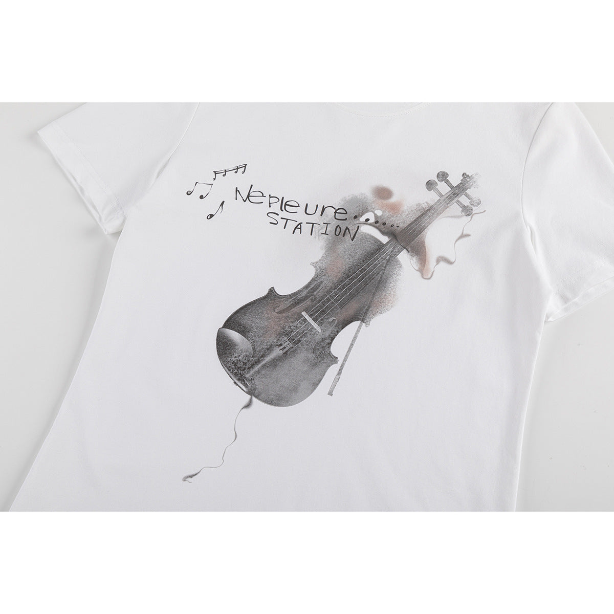 White short-sleeve crew-neck T-shirt with a large violin, watercolor-style graphic, and musical notes on the front.