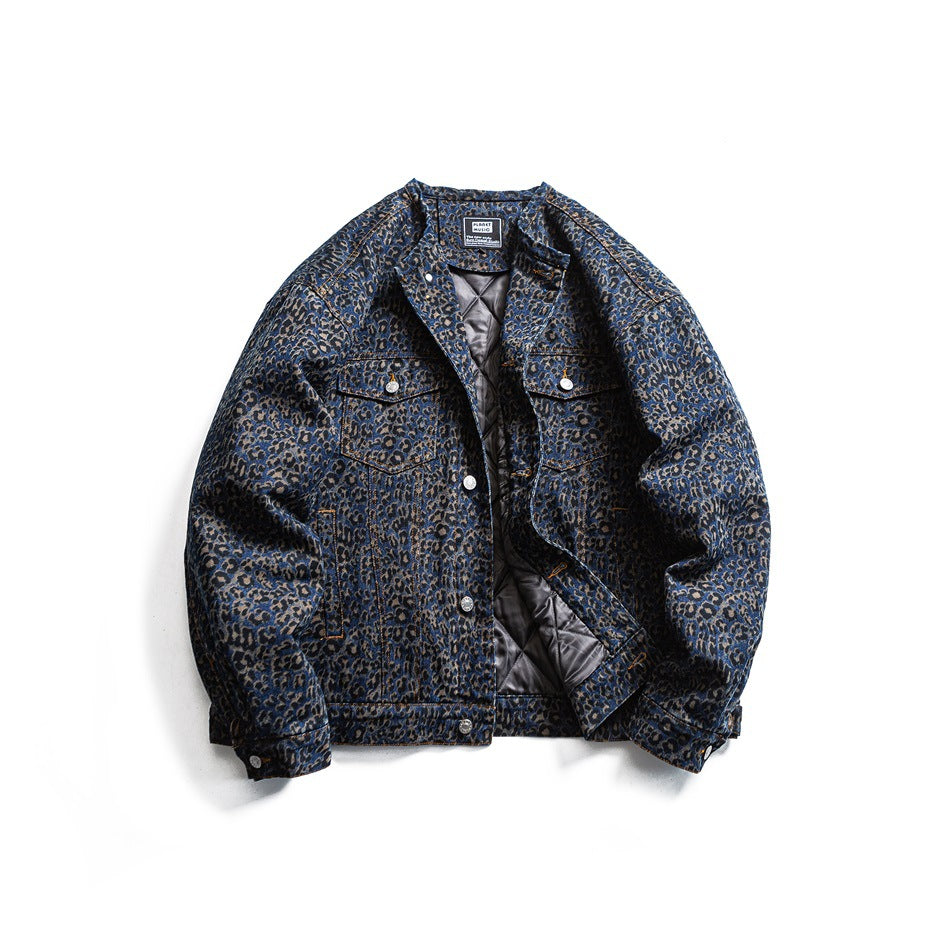 Blue leopard-print jacket partly open showing gray diamond-quilted lining, flat lay