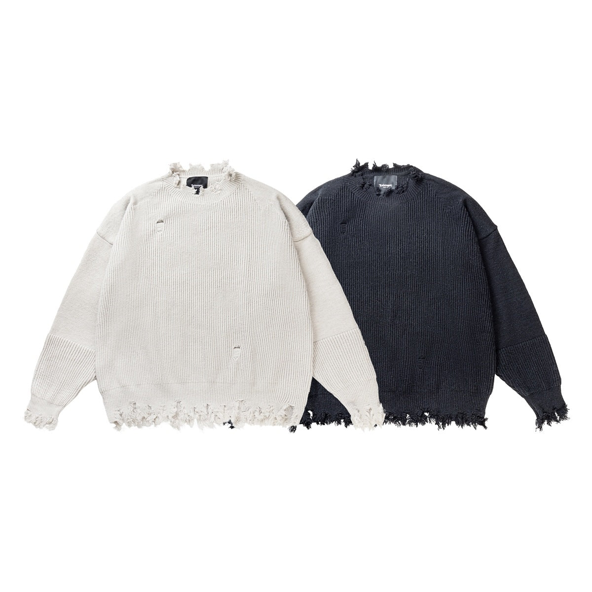 Two distressed rib-knit crewneck sweaters shown from the front in ivory and charcoal, with frayed hems and cuffs.