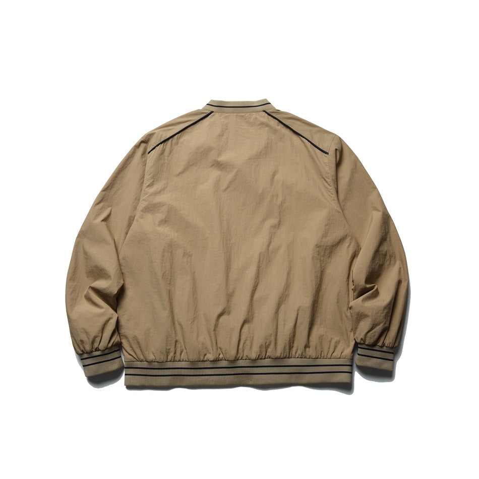 Full back view of a tan jacket with dark shoulder piping and striped ribbed collar, cuffs, and hem.