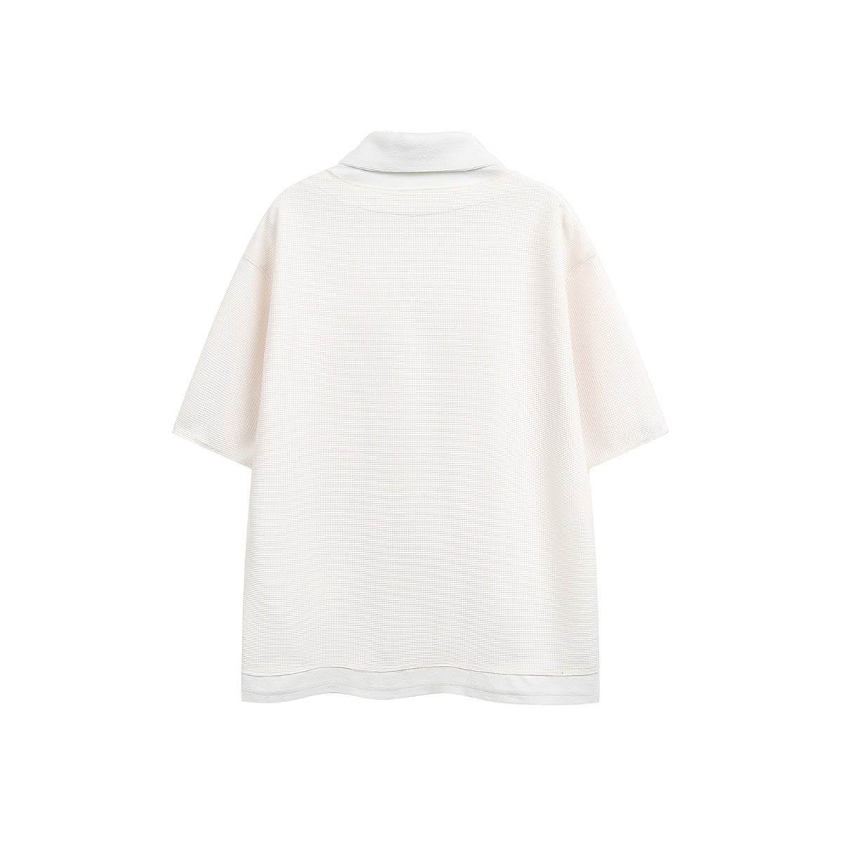 Back view of apricot beige waffle-knit polo top with white collar and layered hem