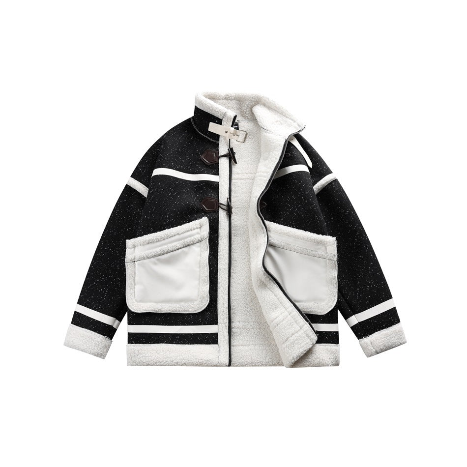 Black speckled jacket with front zip partly open, showing cream fleece-like interior, toggles and large patch pockets