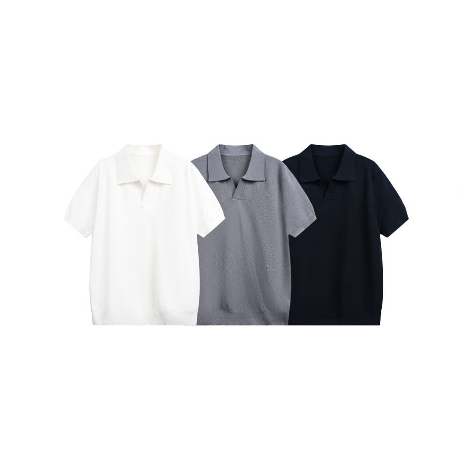 Three short-sleeve polos with notched collars shown in white, gray, and dark navy.