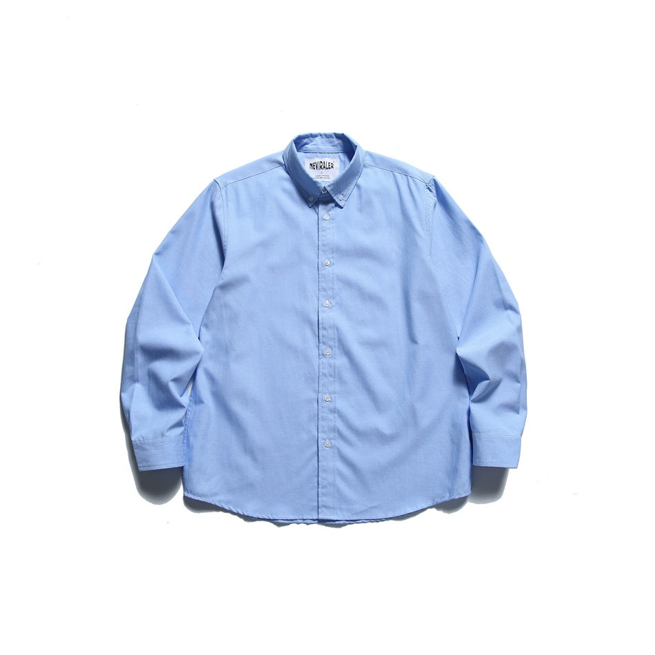 Light blue long-sleeve button-down oxford-style shirt, front flat view with buttoned placket and cuffs