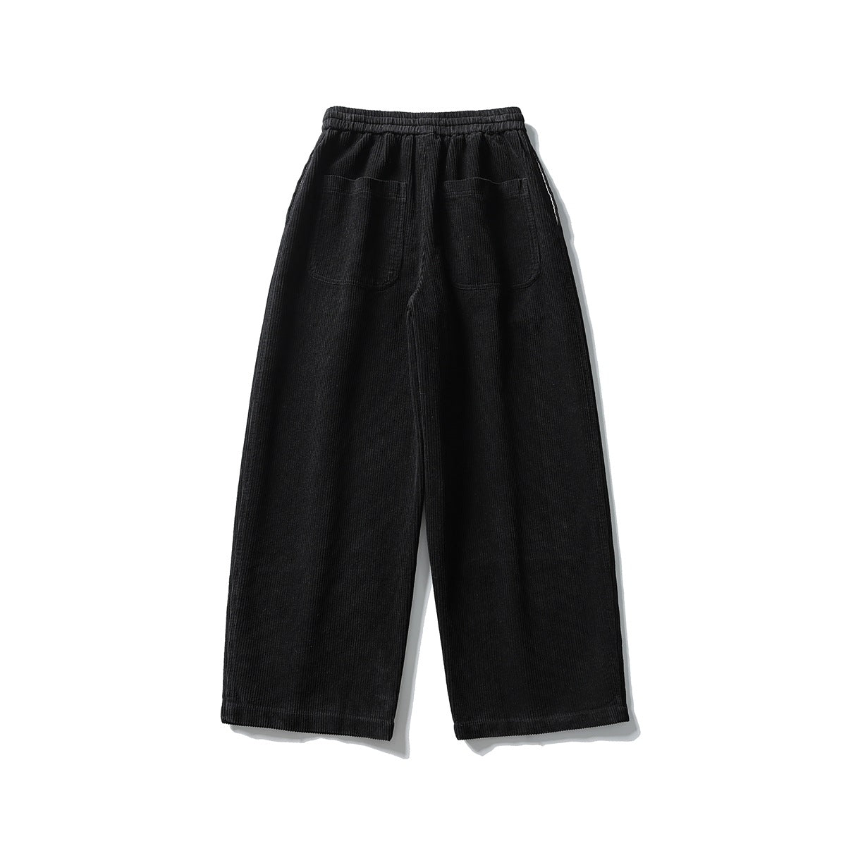 Black corduroy wide-leg pants back view showing two patch pockets and an elastic waistband