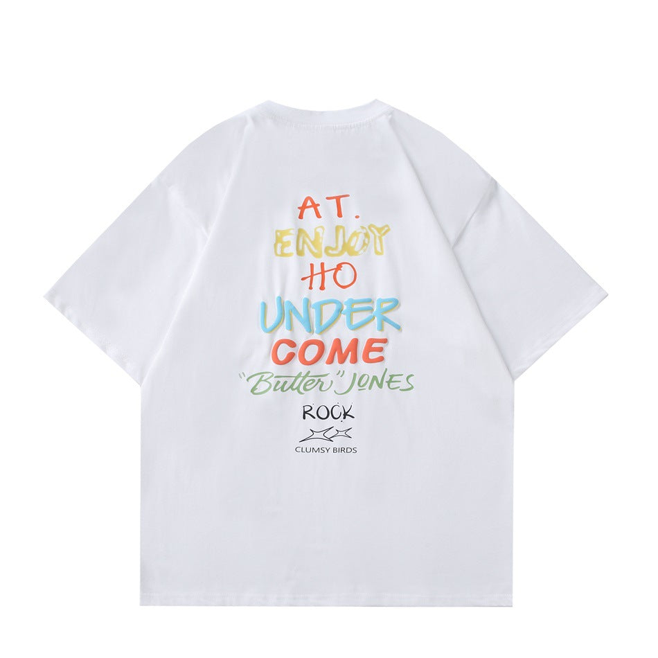Back view of a white short-sleeve T-shirt with colorful lettering and a small bird graphic.