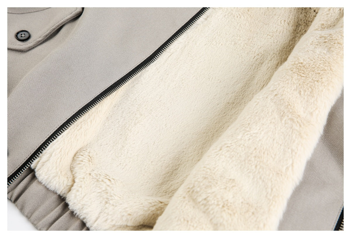 Open taupe jacket showing its cream plush lining and black zipper.