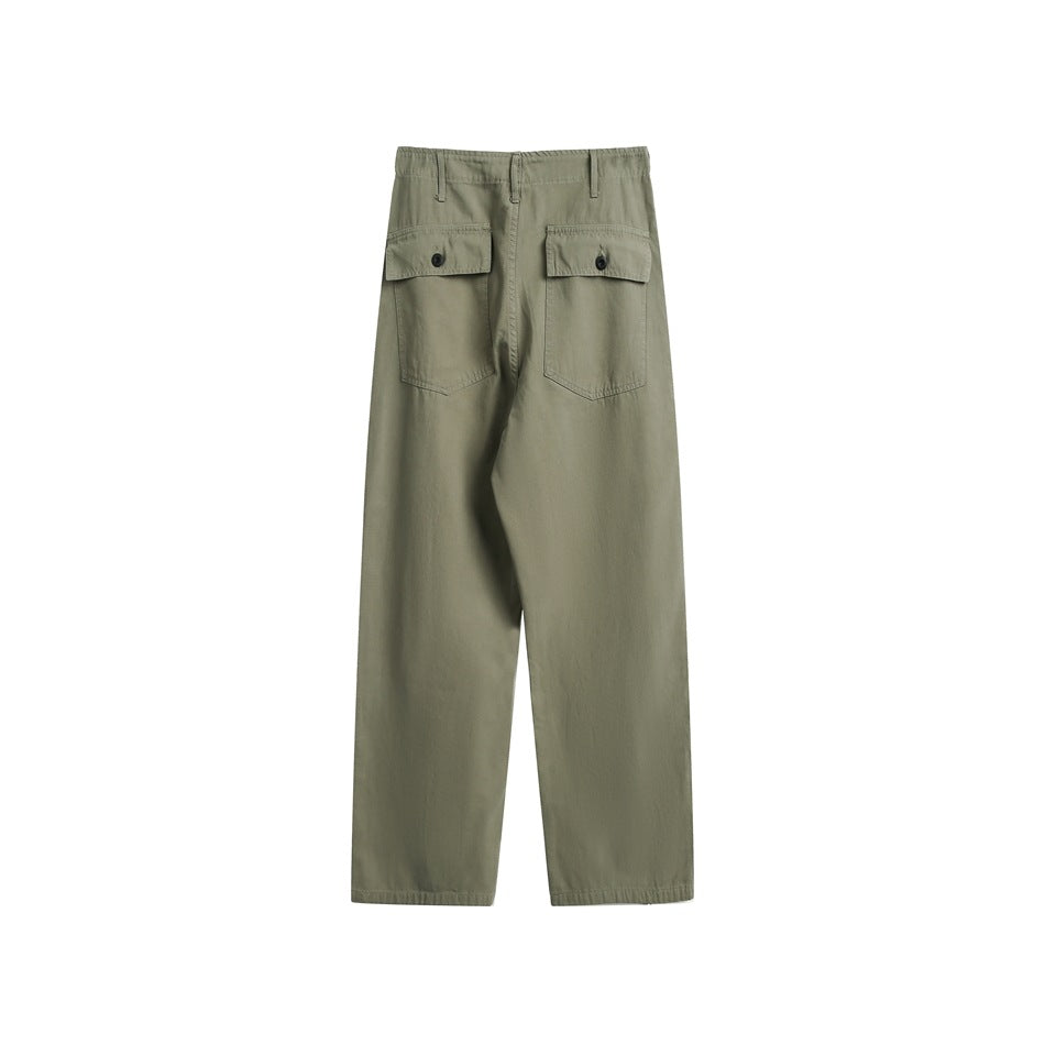 Back view of loose olive trousers with two large button-flap patch pockets and belt loops.