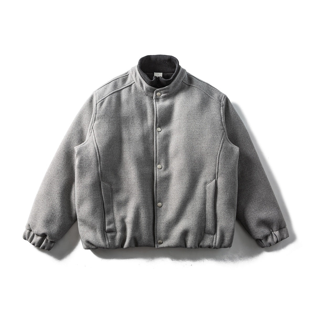 Gray stand-collar jacket flat lay with snap-button front, slanted pockets and elastic cuffs and hem