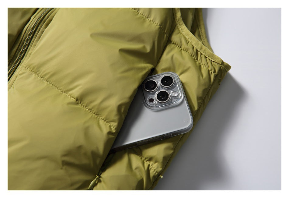Close-up of an olive-yellow jacket pocket holding a smartphone.